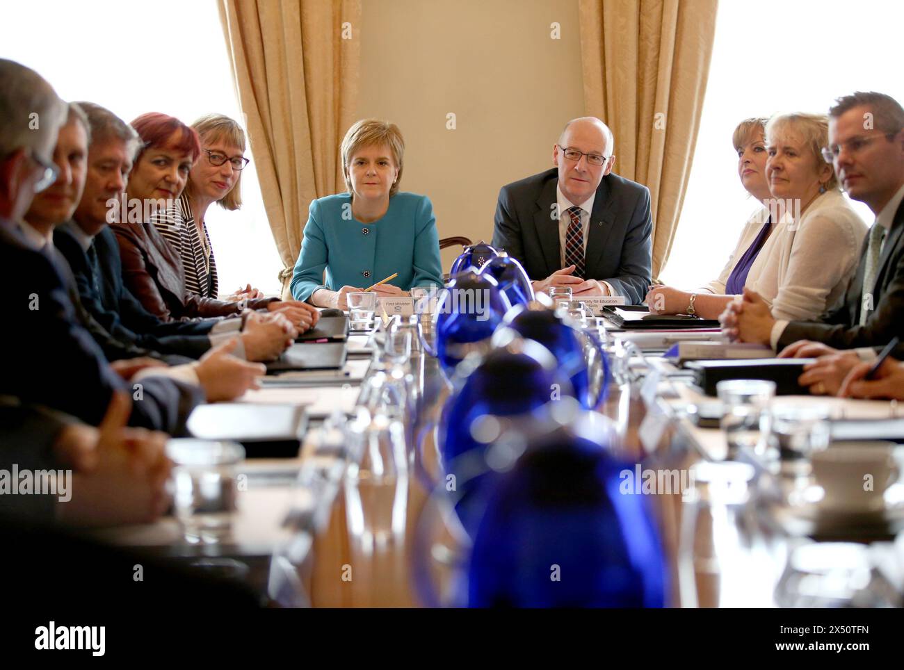 File photo dated 25/06/16 of the then First Minister Nicola Sturgeon and Deputy First Minister John Swinney (centre) during an emergency cabinet meeting at Bute House in Edinburgh. Former Scottish deputy first minister John Swinney has been confirmed as the SNP's new leader - with no other possible candidates coming forward to challenge him for the position. Issue date: Monday May 6, 2024. Stock Photo