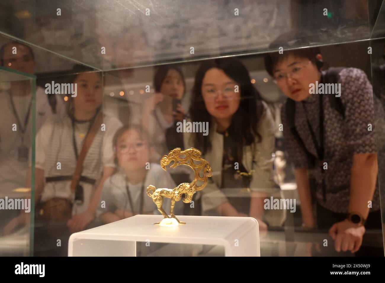 240506-beijing-may-6-2024-xinhua-tourists-look-at-an