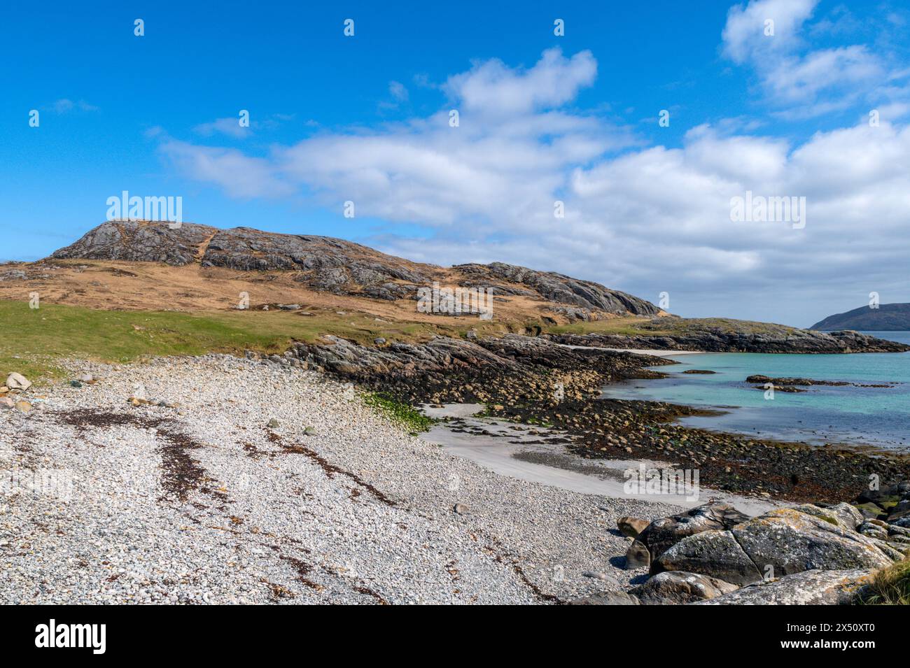 Smalla beach at Eorasdail on Vatersay in the Outer Hebrides of Scotland. Stock Photo