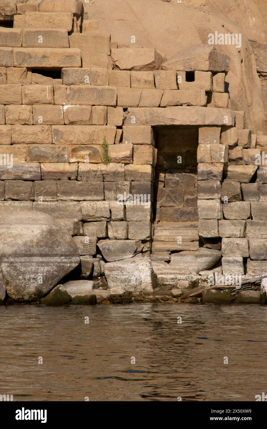 Elephantine, Egypt. Island in the Nile River, opposite the city of Aswan. Detail of the nilometer. Stepped construction in the rock, with marks to measure the flow of the Nile river during the annual flood season. Taxes were established on the basis of this information, besides to be able to calculate the volume of the crop to be harvested in the fields. Stock Photo