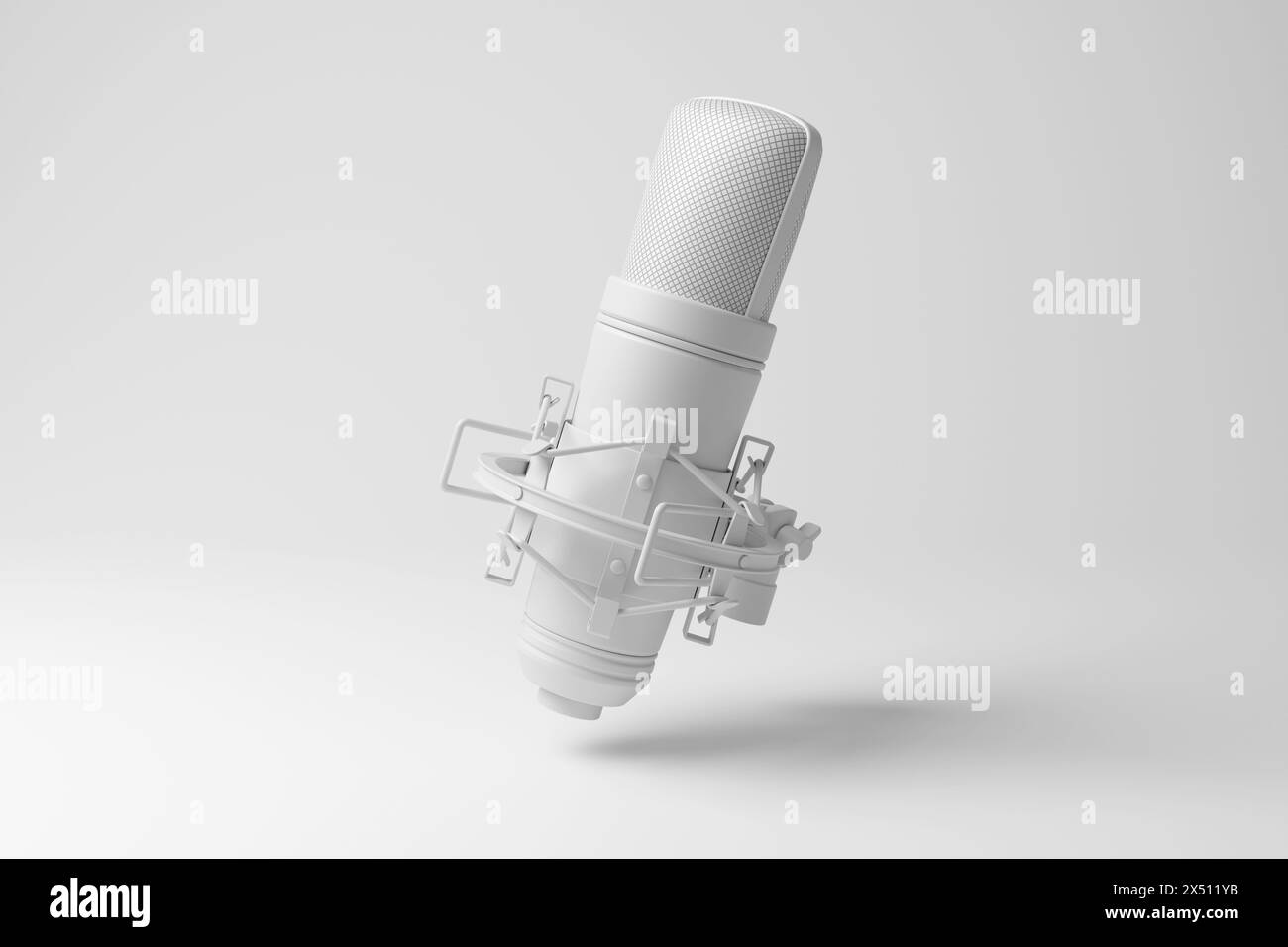 White studio condenser microphone floating in mid air in monochrome and minimalism. Concept of recording studios for music production and vocals Stock Photo