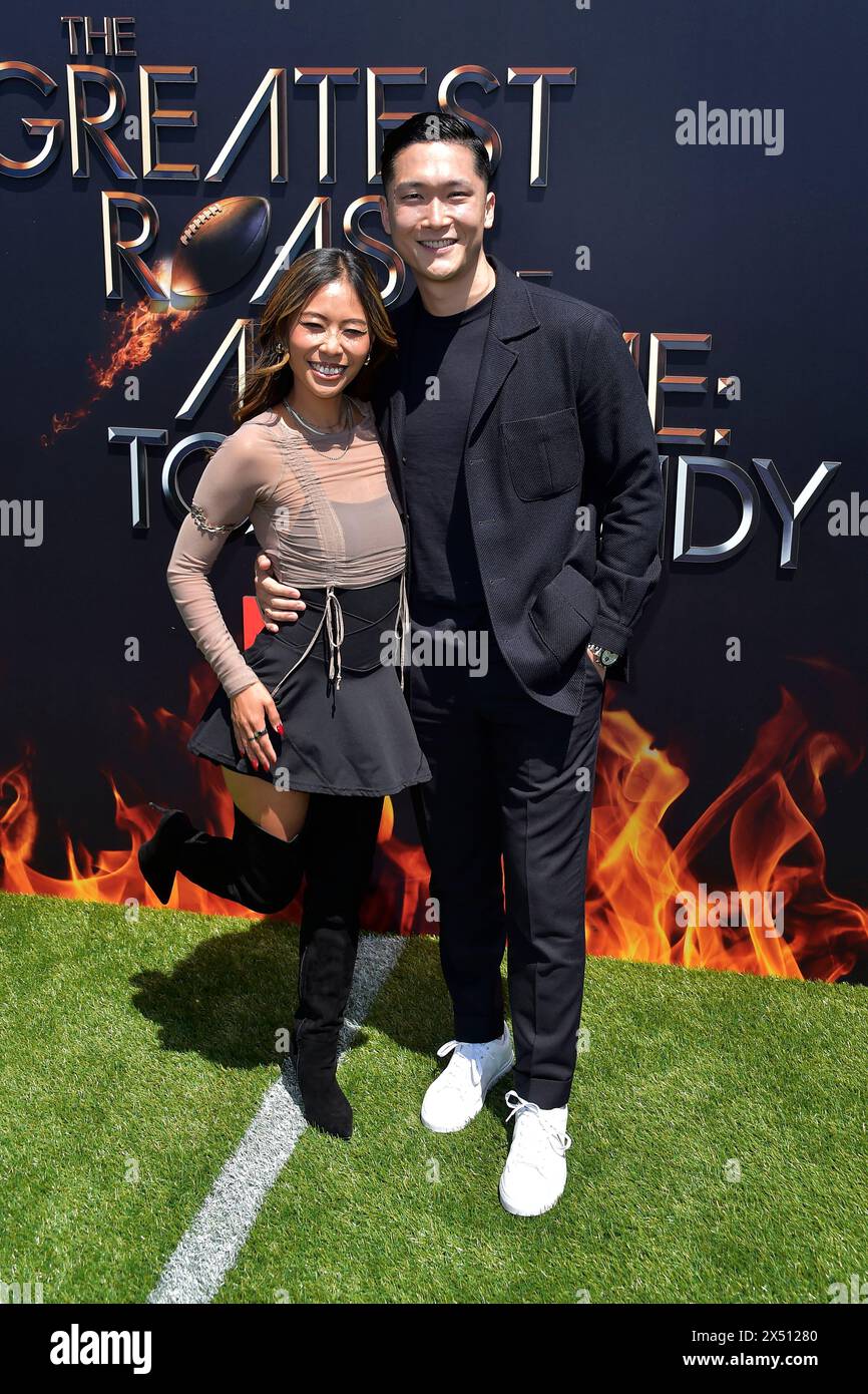 Jessica Woo und Sam Hyun bei der Netflix-Show 'The Greatest Roast of All Time: Tom Brady' im Kia Forum. Inglewood, 05.05.2024 Stock Photo