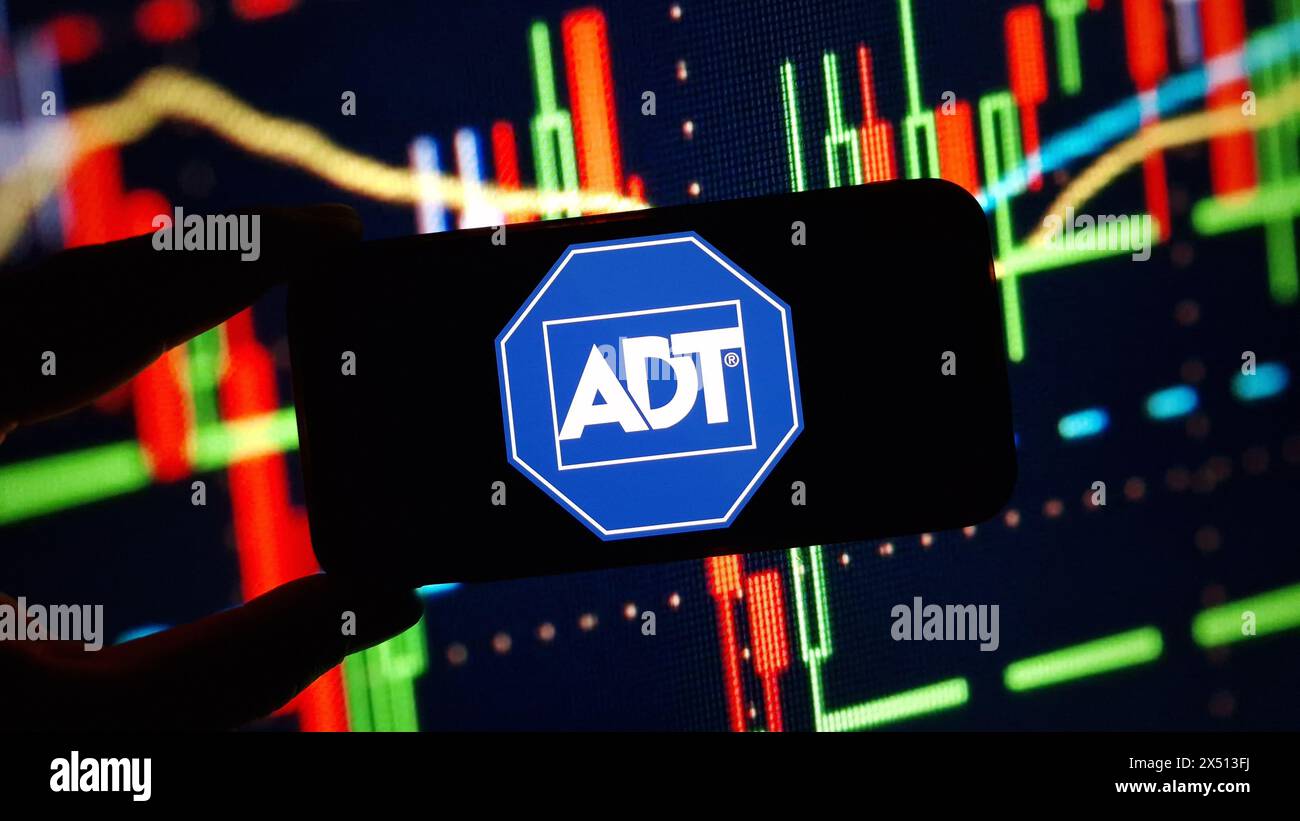 Konskie, Poland - March 17, 2024: ADT company logo displayed on mobile phone screen Stock Photo