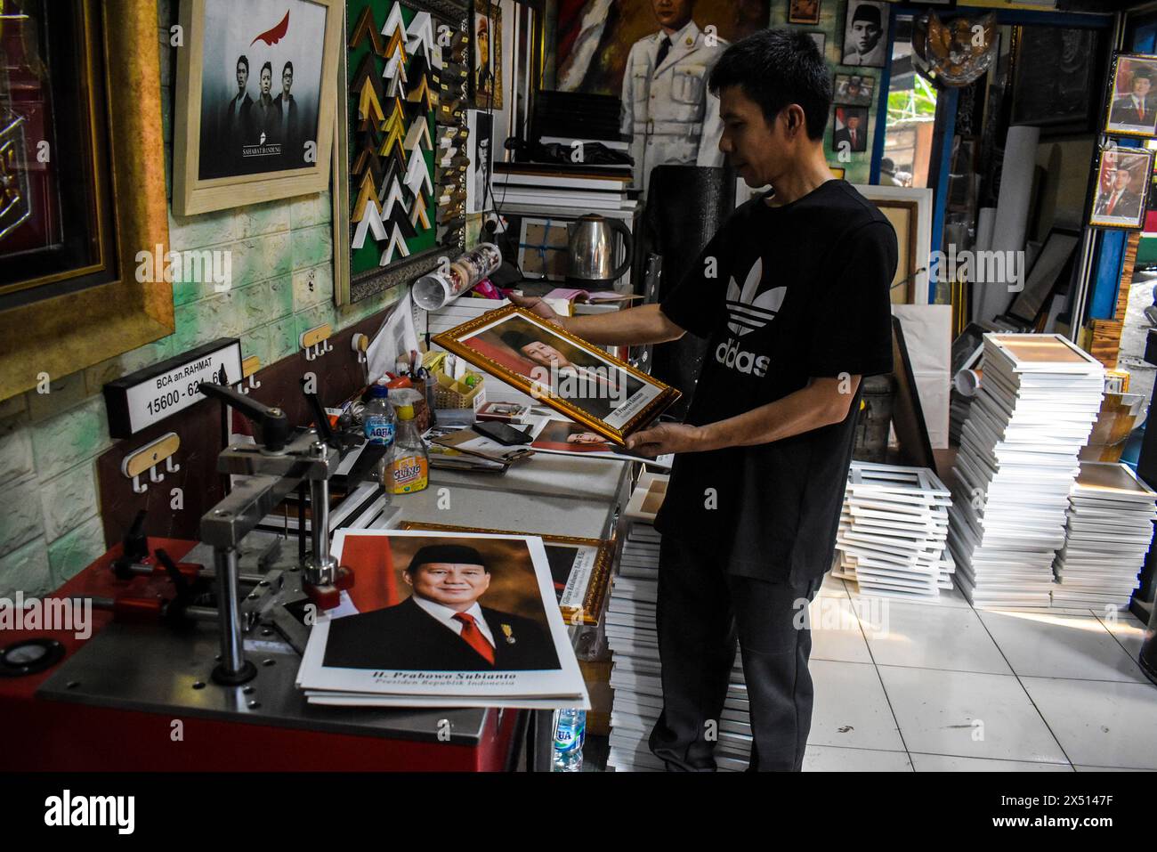 A trader sells framed photos of the President and Vice President of Indonesia elected for the 2024-2029 term of Prabowo Subianto and Gibran Rakabuming Raka in Bandung, West Java, Indonesia, on May 6, 2024. (Photo by Dimas Rachmatsyah/Sipa USA) Credit: Sipa USA/Alamy Live News Stock Photo