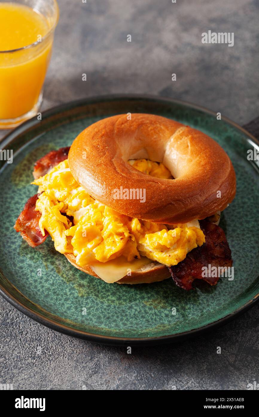 breakfast egg and bacon sandwich on bagel with cheese Stock Photo - Alamy