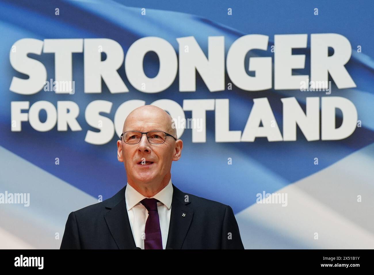 Newly elected leader of the Scottish National Party (SNP) John Swinney delivers his acceptance speech at Advanced Research Centre (ARC), Glasgow University, after he was confirmed as the SNP's new leader - with no other possible candidates coming forward to challenge him for the position. Picture date: Monday May 6, 2024. Stock Photo