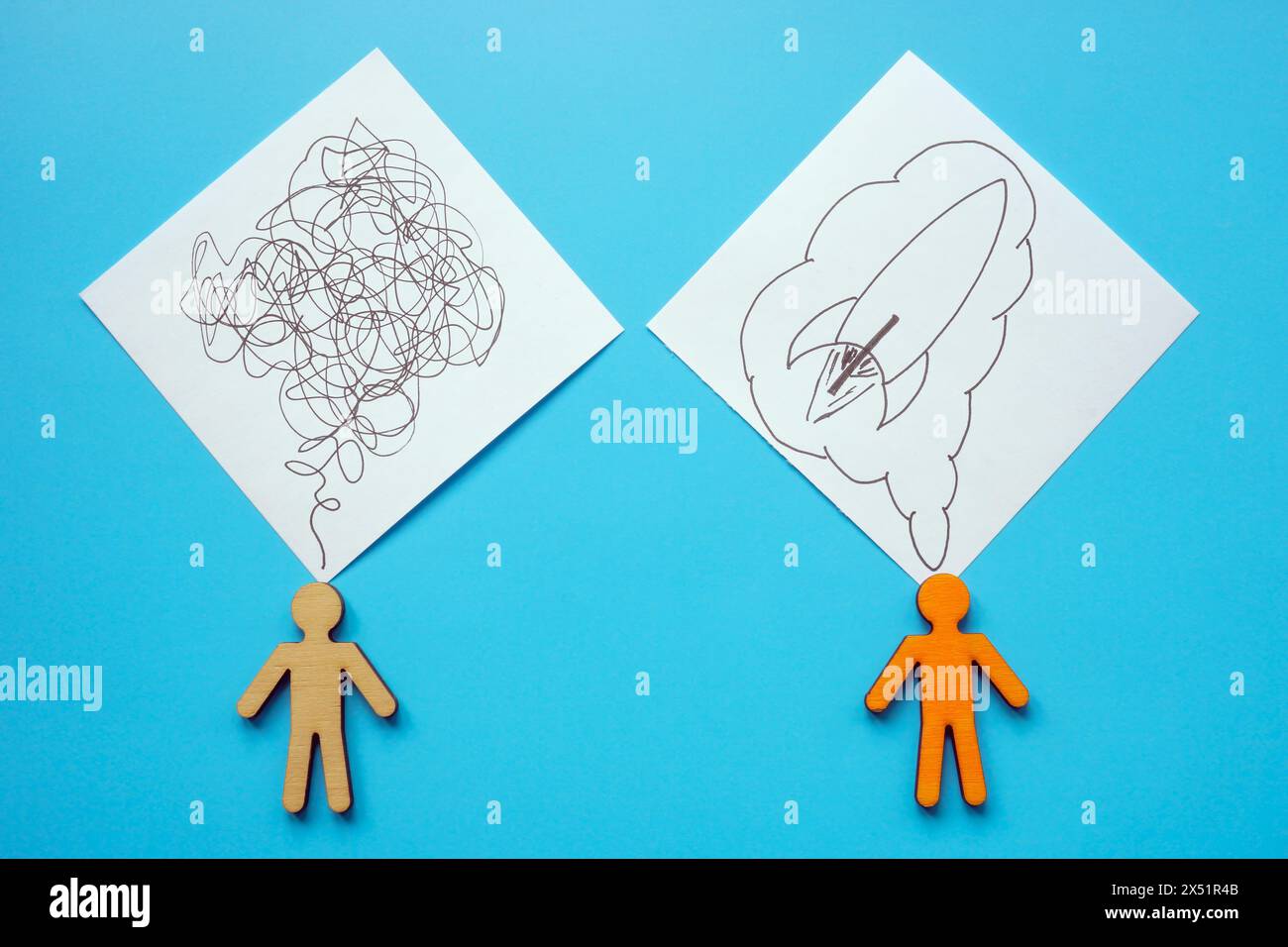 Two figures and stickers symbolizing the search for a solution and a new idea. Stock Photo