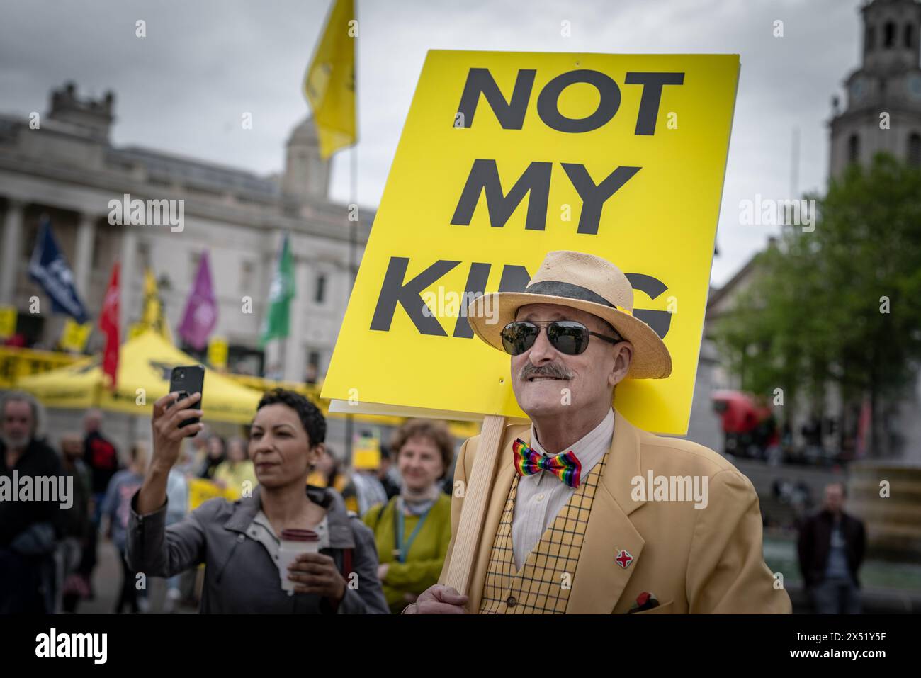 London, UK. 5th May 2024. Anti-monarchy campaign group Republic hold a rally in London’s Trafalgar Square ahead of the anniversary of King Charles’s coronation. About 100 people attend with parallel events in Edinburgh and Cardiff calling for the abolition of the monarchy. It will be a year since the king’s coronation on Monday, when gun salutes across the capital will commemorate his reign. Protesters chant “Abdicate, abdicate” in front of two large yellow banners that read “Abolish the monarchy” and “Change the country for good.” Credit: Guy Corbishley/Alamy Live News Stock Photo