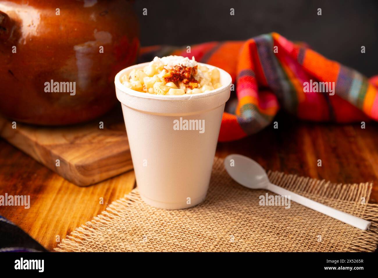 Esquites. Corn kernels cooked and served with mayo, sour cream, lemon