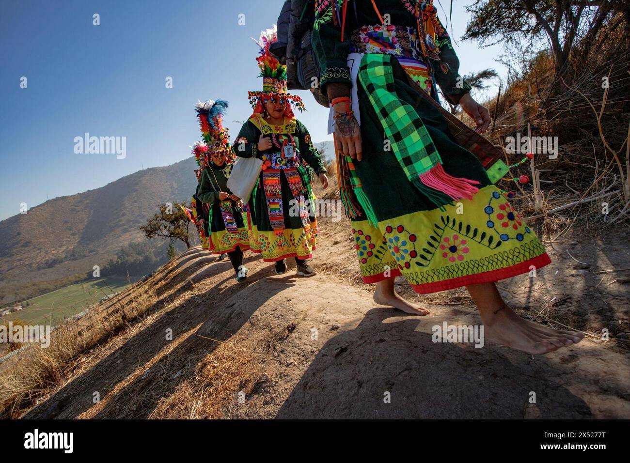 Santiago, Chile. 04th May, 2024. People are climbing Chena Hill in traditional tinku costumes during the Chakana celebration on May 4, 2024. (Photo by Francisco Paredes/NurPhoto)0 Credit: NurPhoto SRL/Alamy Live News Stock Photo