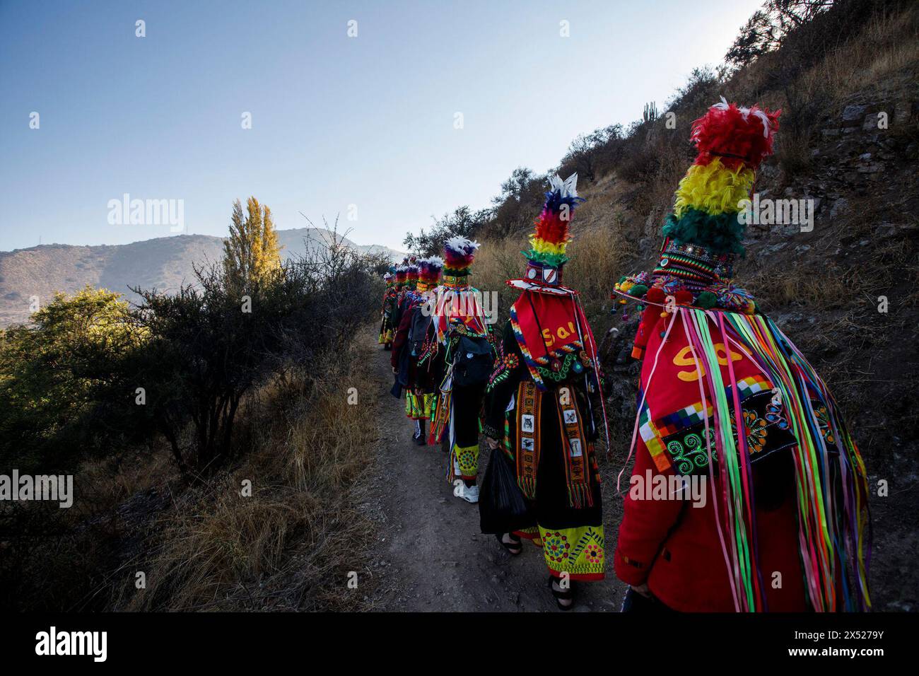 Santiago, Chile. 04th May, 2024. People are climbing Chena Hill in traditional tinku costumes during the Chakana celebration on May 4, 2024. (Photo by Francisco Paredes/NurPhoto)0 Credit: NurPhoto SRL/Alamy Live News Stock Photo