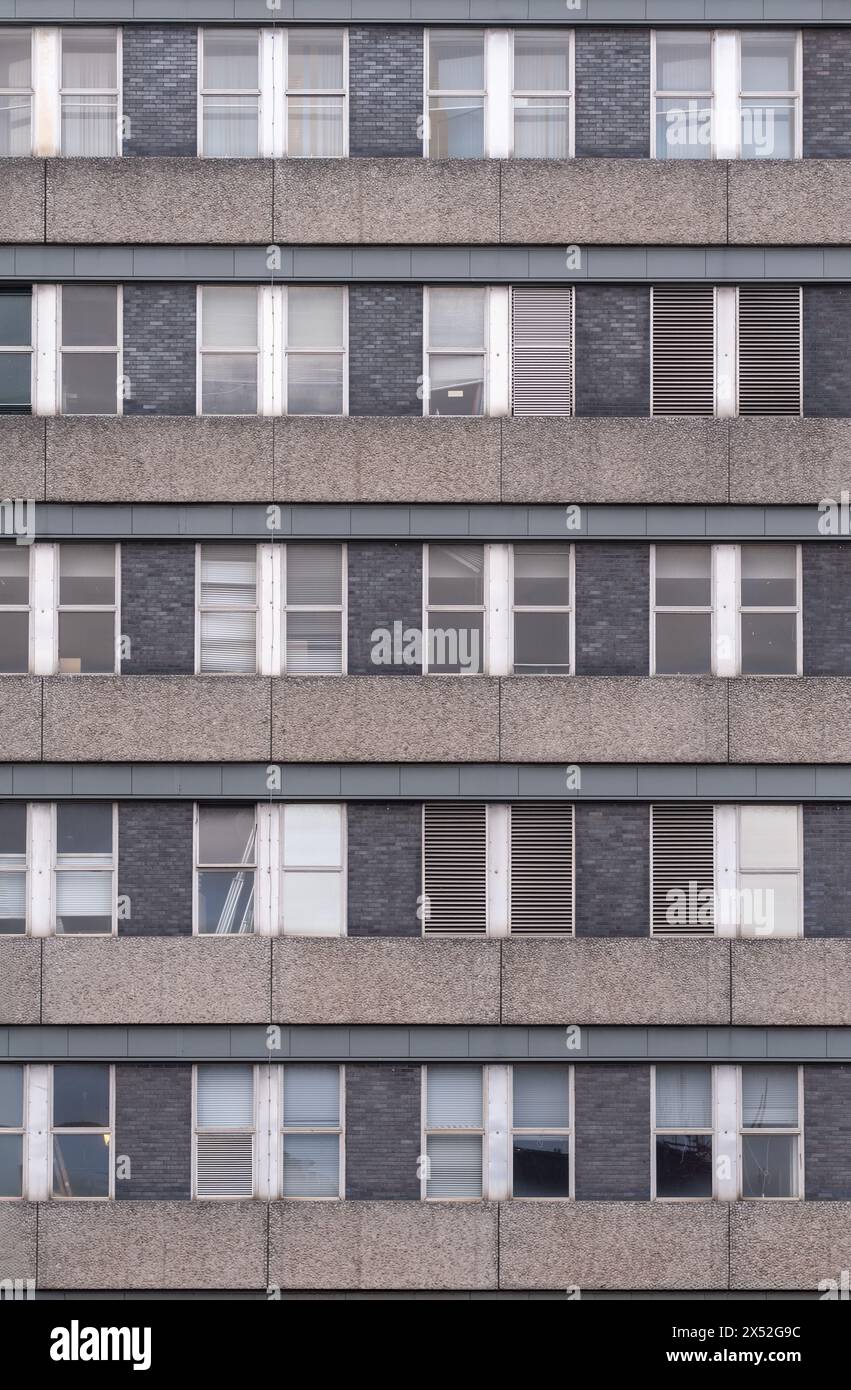 Background Of A Grim 1970s Grey Office Building Stock Photo