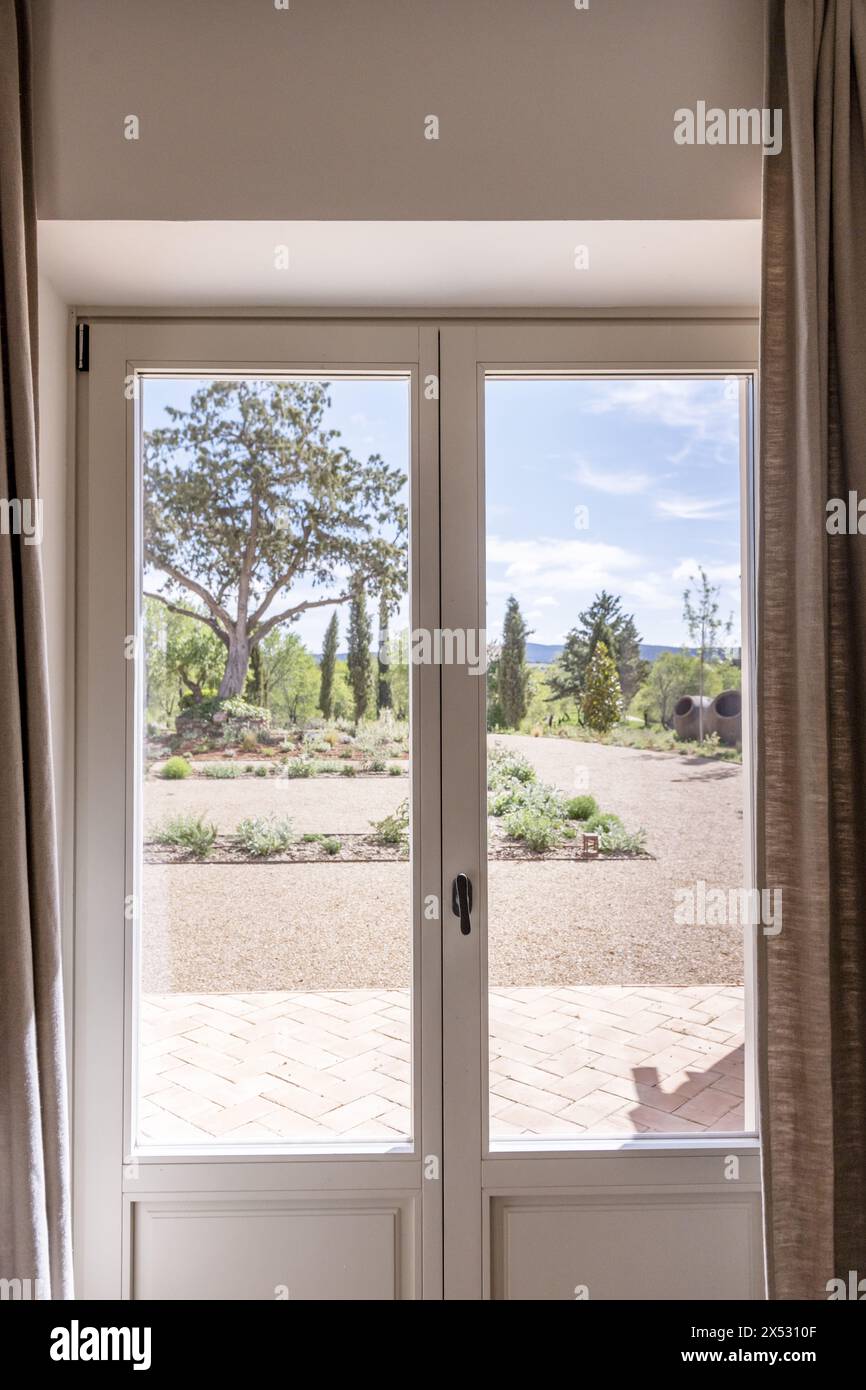 some aluminum doors with the upper part with windows and views of a ...
