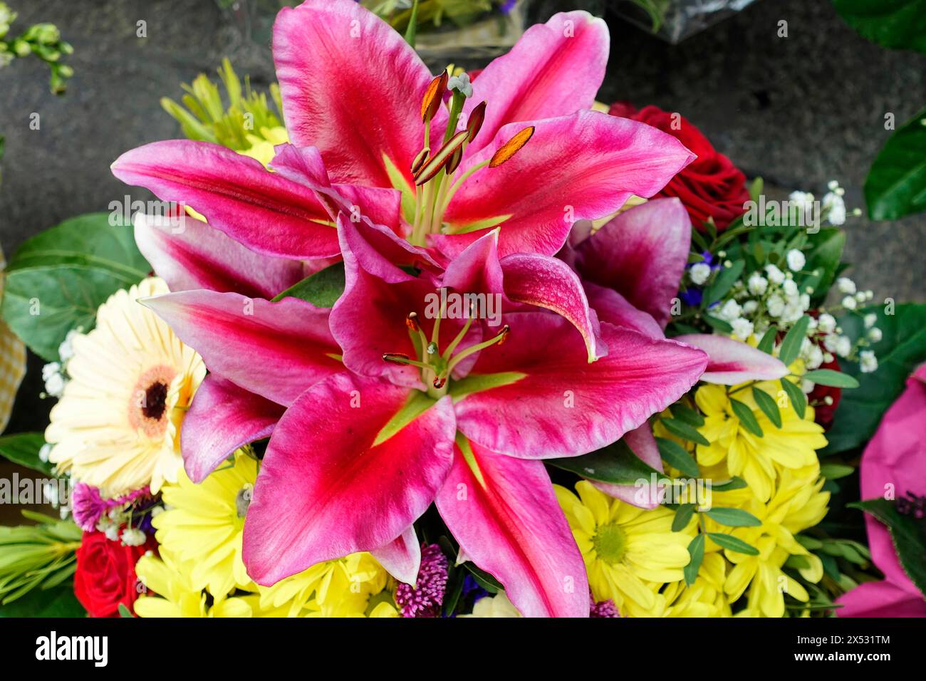 Lively bouquet with a large pink Lily (Lilium candidum) in focus, flower sale, Central Station, Hamburg, Hanseatic City of Hamburg, Germany Stock Photo