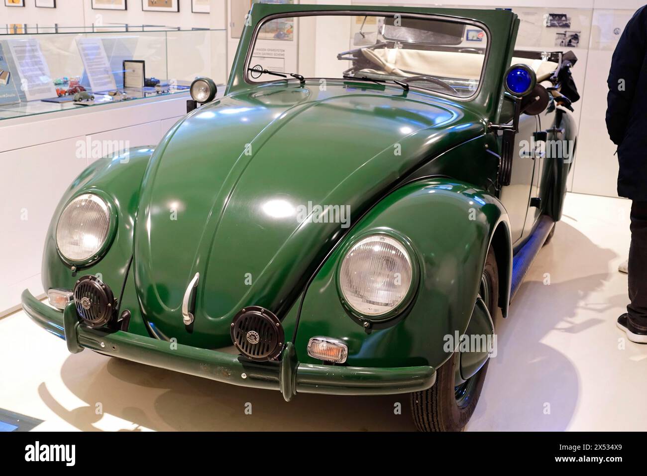 A green Volkswagen Beetle Cabriolet in shiny condition stands in the museum, AUTOMUSEUM PROTOTYP, Hamburg, Hanseatic City of Hamburg, Germany Europe Stock Photo