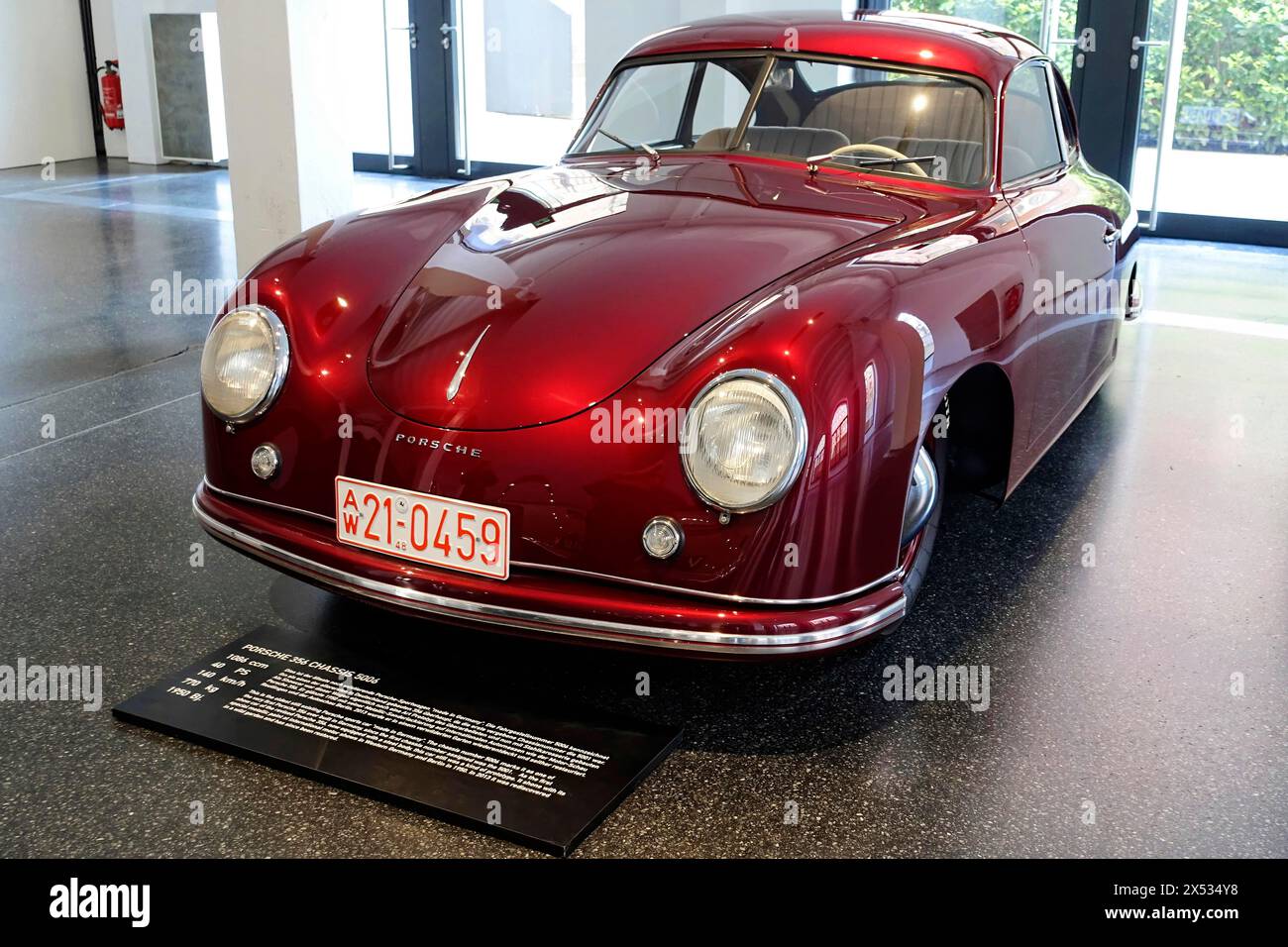 A red Porsche 356 Coupe on display, view of the front of the historic ...