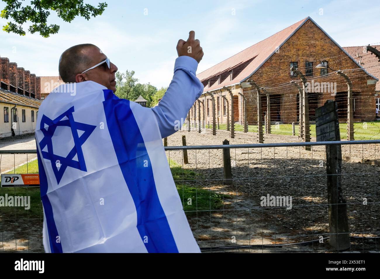 A Visitor Takes A Souvenir Photo As He Arrive For The March Of The ...