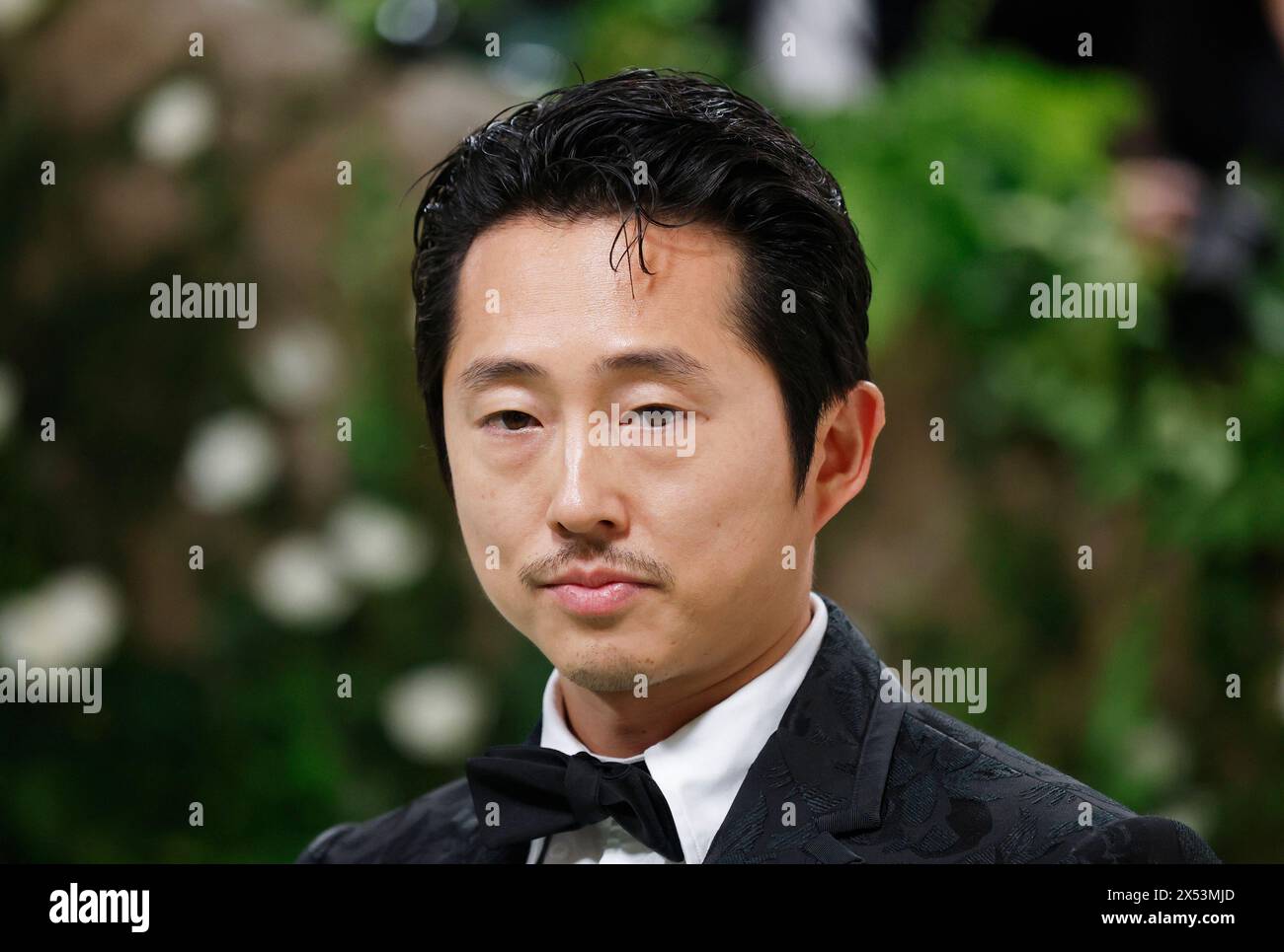 New York, United States. 06th May, 2024. Steven Yeun arrives on the red carpet at the 2024 Met Gala celebrating 'Sleeping Beauties: Reawakening Fashion' at The Metropolitan Museum of Art on Monday, May 6, 2024 in New York City. Photo by John Angelillo/UPI Credit: UPI/Alamy Live News Stock Photo
