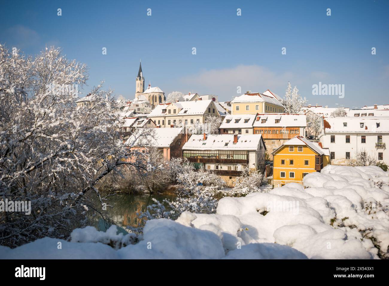 Novo mesto, Dolenjska region, Slovenia. Town covered with snow at sunny day Stock Photo