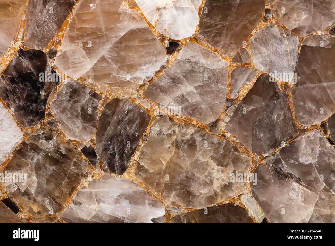 Brown smoky quartz stone slab. Gemstone background. Matt semi precious mineral pattern. Semiprecious texture for ceramic wall, floor digital tiles. Ma Stock Photo