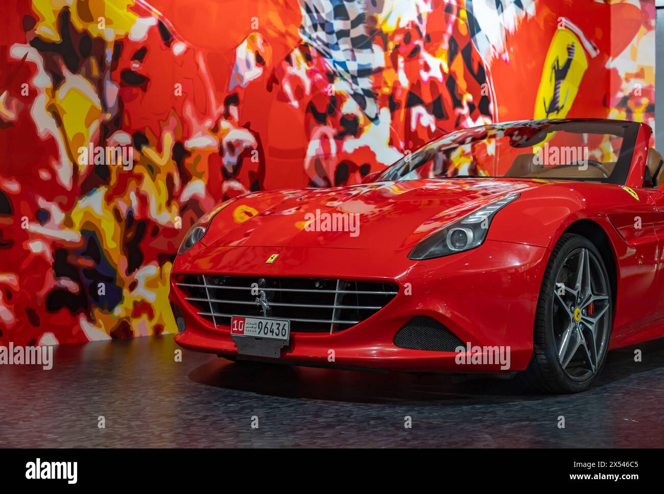 A picture of a red Ferrari California T at the gift shop of the Ferrari World Yas Island, Abu Dhabi. Stock Photo