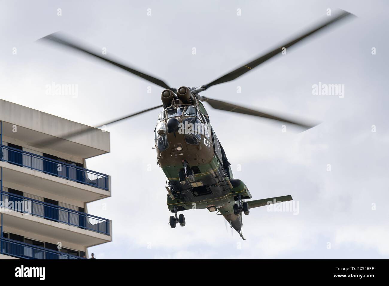 View on a helicopter Aérospatiale SA-330B Puma from French Army for an exercise to drop members of the RAID by helicopter on the roof of a building. Stock Photo