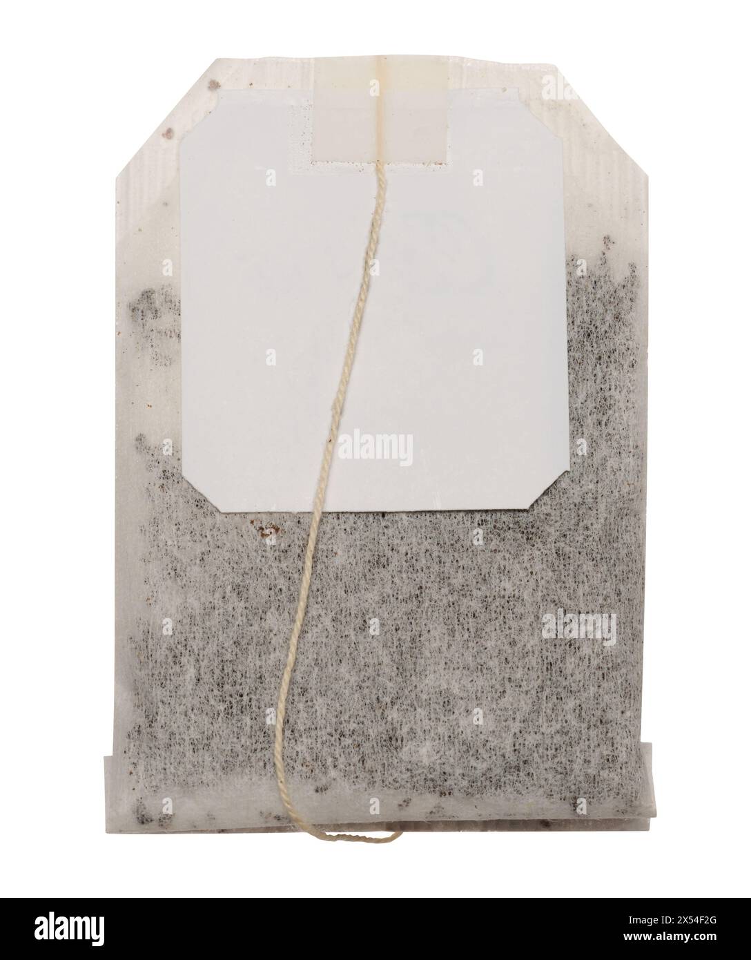 Disposable tea bag with paper label on a string on isolated background Stock Photo