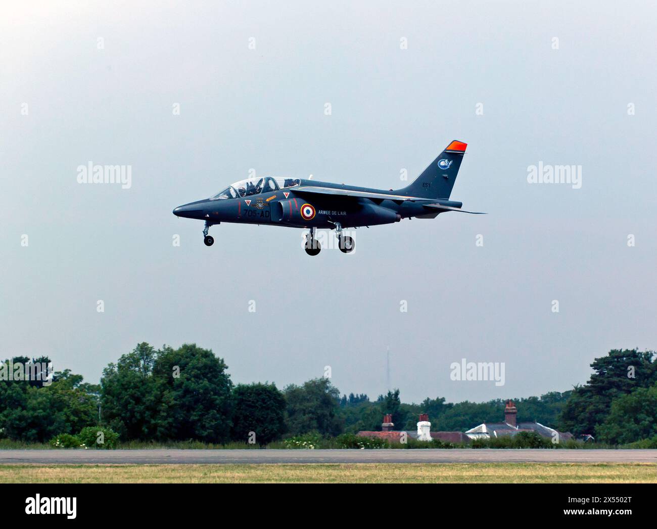 French Air Force's nimble Dassault-Dornier Alpha Jet E landing after its solo display at the 2010 Biggin Hill International Air Fair. Stock Photo
