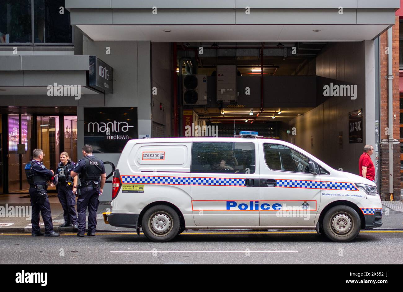 Police officers attending an incident in the Business District of Brisbane, Australia Stock Photo