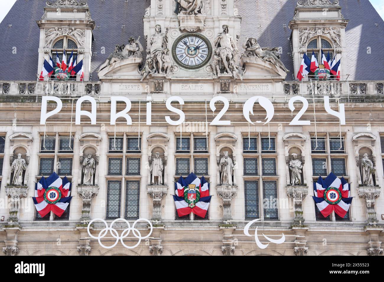 Olympic branding affixed to the Hotel de Ville ahead of the Paris Olympic Games 2024. Picture date: Tuesday May 7, 2024. Stock Photo