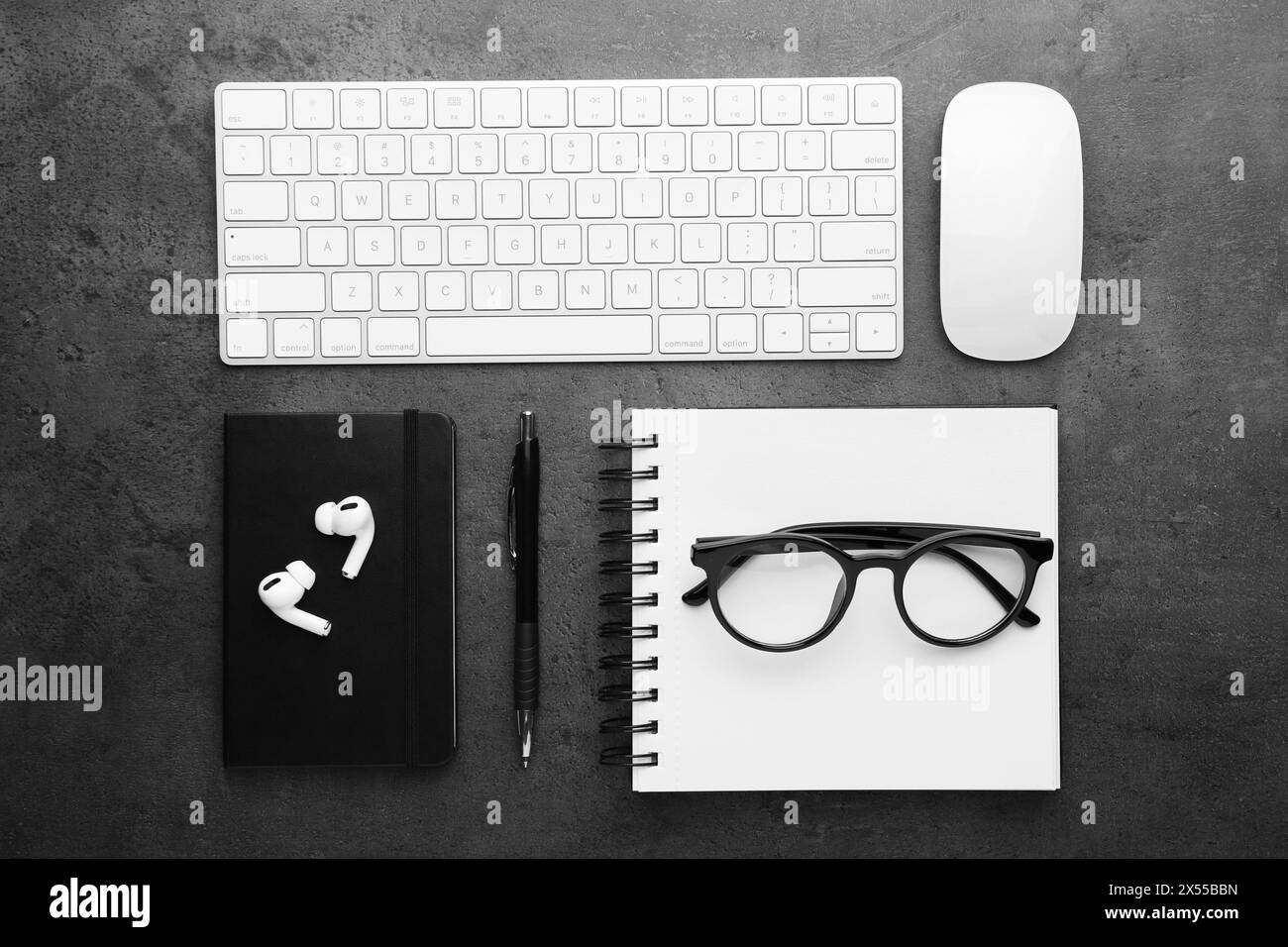 Flat lay composition with different office stationery on dark grey ...