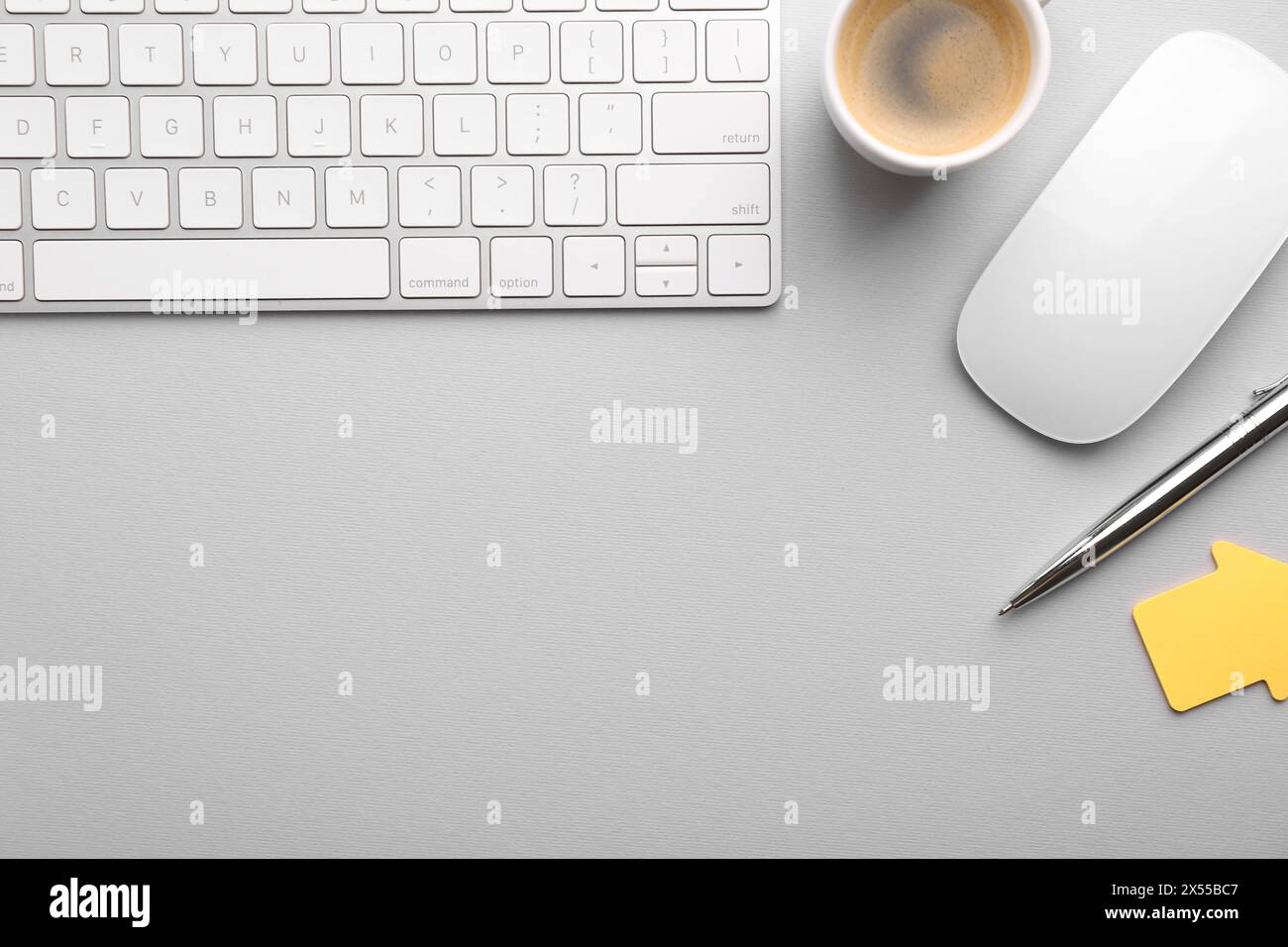 Flat lay composition with different office stationery on light grey ...