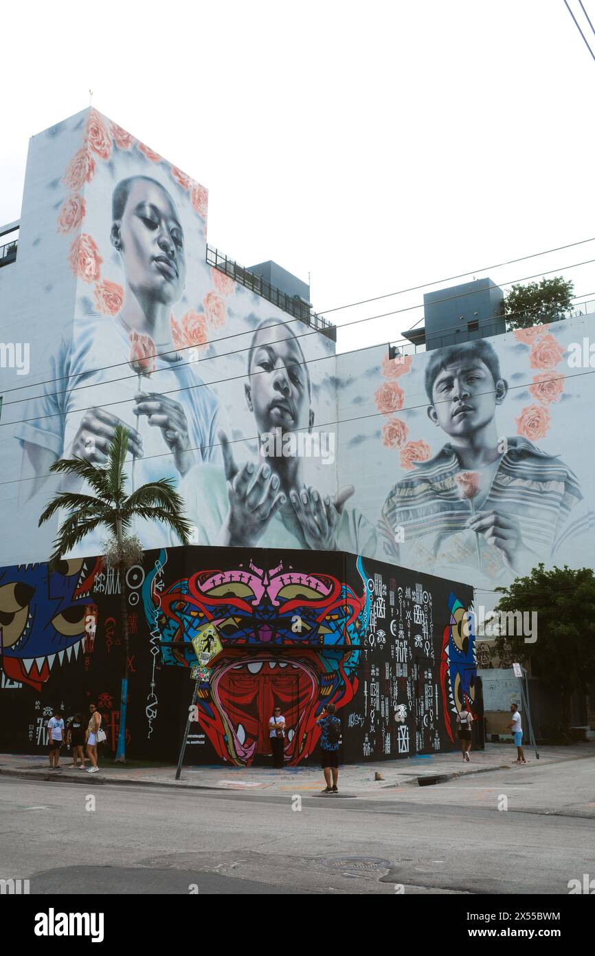 Famous Colorful Murals On The Street Walls Of Wynwood Neighborhood. Exploring The Art Culture In Miami, Florida. Stock Photo