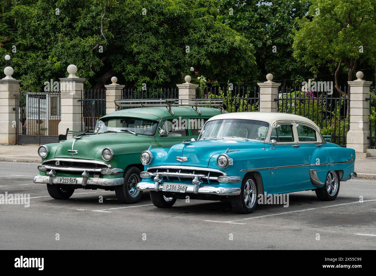 HAVANA, CUBA - AUGUST 27, 2023: Two Chevrolet BelAir 1954 wagon and sedan cars in Havana, Cuba Stock Photo