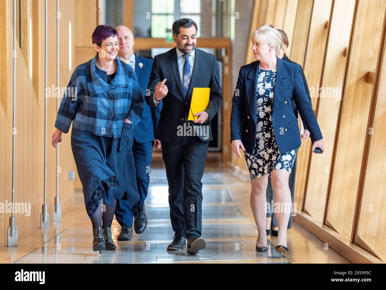Humza Yousaf arrives with Angela Constance (left) and Shona Robison (right), to deliver a personal statement to the chamber following his resignation as First Minister at the Scottish Parliament in Edinburgh. Picture date: Tuesday May 7, 2024. Stock Photo