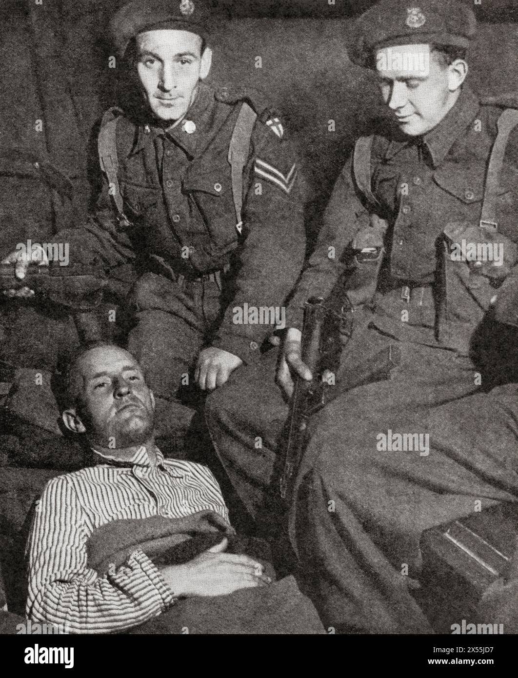 Lord Haw Haw just after his capture.  William Brooke Joyce, 1906 – 1946, nicknamed Lord Haw-Haw.  American-born fascist, Nazi propaganda broadcaster during the Second World War and member of Oswald Mosley's British Union of Fascists (BUF).  From The War in Pictures, Sixth Year. Stock Photo