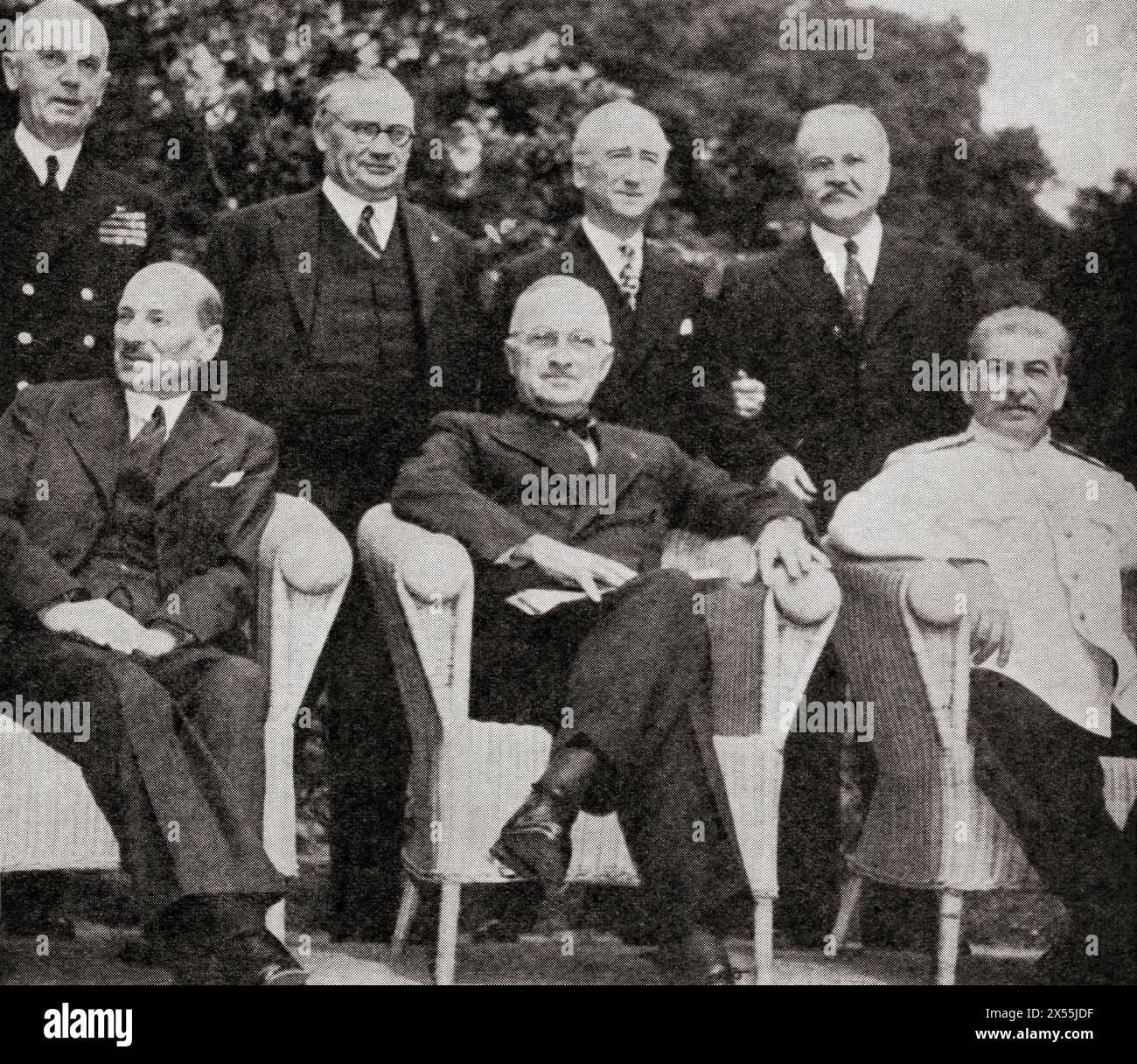 The Potsdam Conference, 1945. Front row from left to right: Mr Attlee, President Truman and Stalin. Back row from left to right: Admiral Leahy, Mr. Ernest Bevin, Mr J Byrnes and M Molotov.  Clement Richard Attlee, 1st Earl Attlee, 1883 – 1967. British statesman and Labour Party politician, Prime Minister of the United Kingdom.  Harry S. Truman, 1884 – 1972. 33rd president of the United States of America.  Joseph Vissarionovich Stalin, 1878 –  1953.  Soviet revolutionary and politician, leader of the Soviet Union and General Secretary of the Communist Party of the Soviet Union.  From Stock Photo