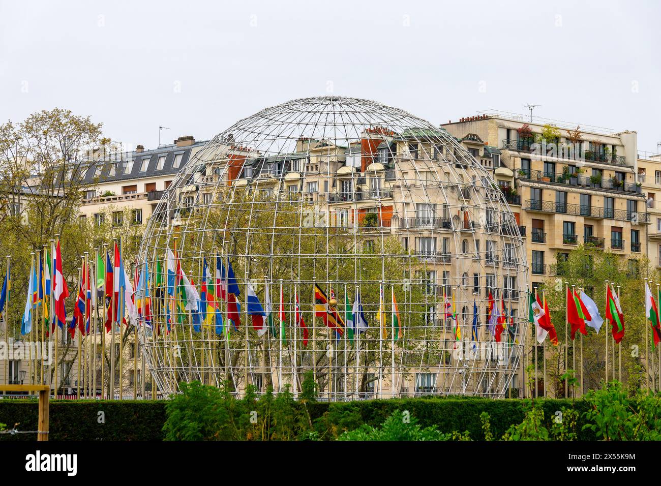 The Symbolic Globe and the flags of all nations, modern monument in the headquarters of Unesco in Paris, France Stock Photo