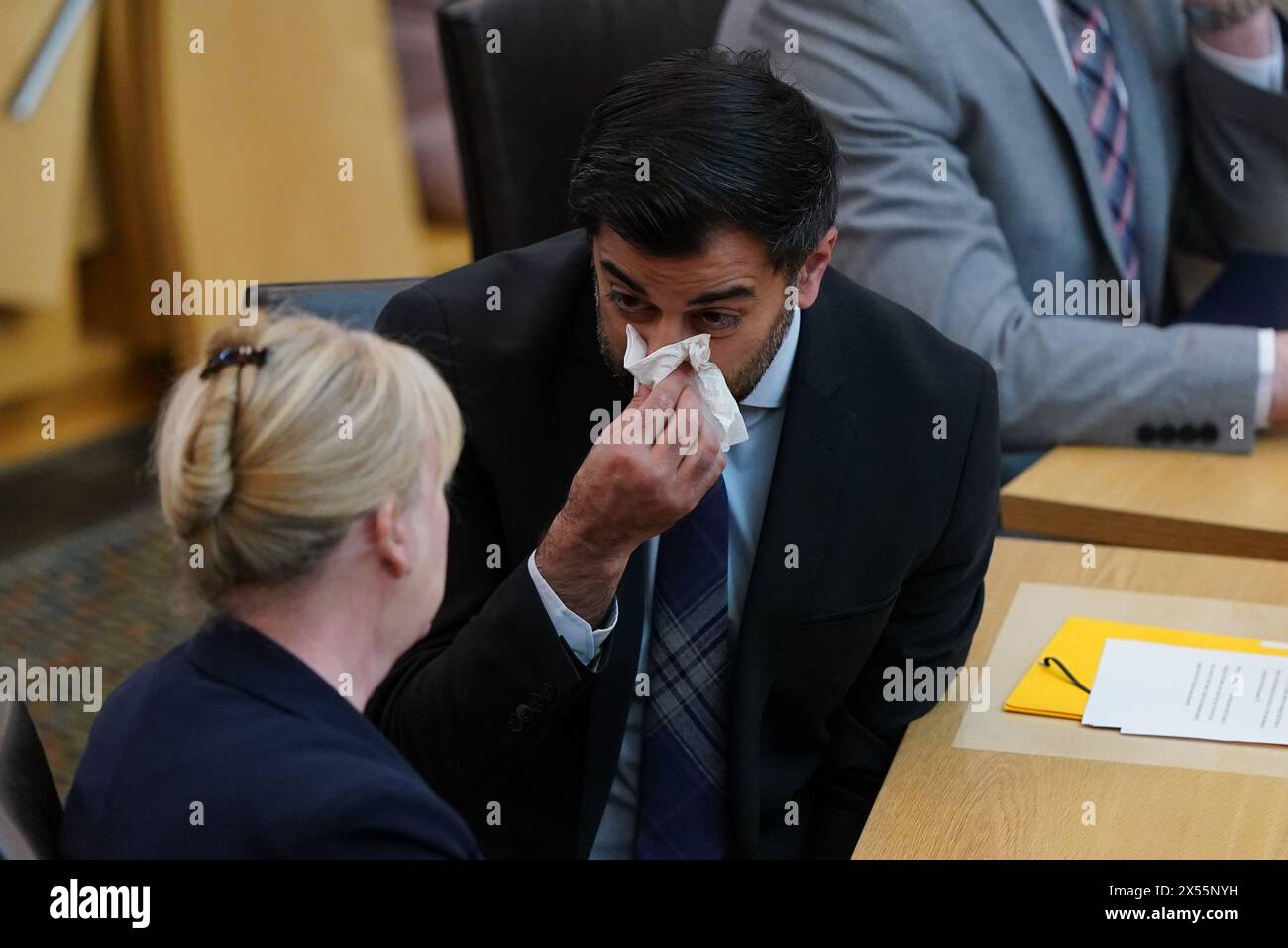 Humza Yousaf talks with Deputy First Minister of Scotland Shona Robison, prior to making his final speech to the Scottish Parliament as outgoing First Minister at the Scottish Parliament in Edinburgh. Picture date: Tuesday May 7, 2024. Stock Photo