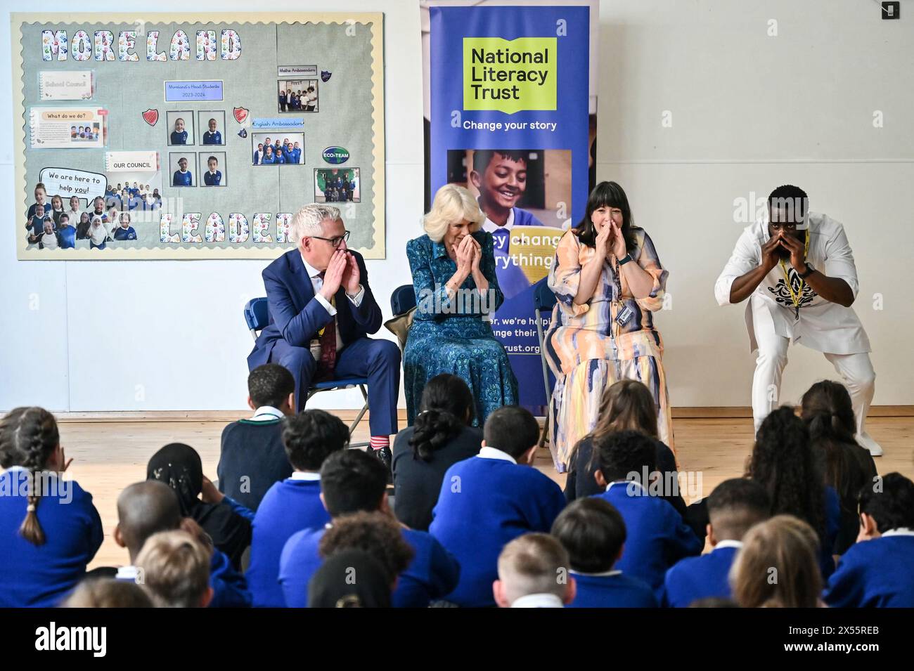 Queen Camilla joins Chief Executive, National Literacy Trust Jonathan ...