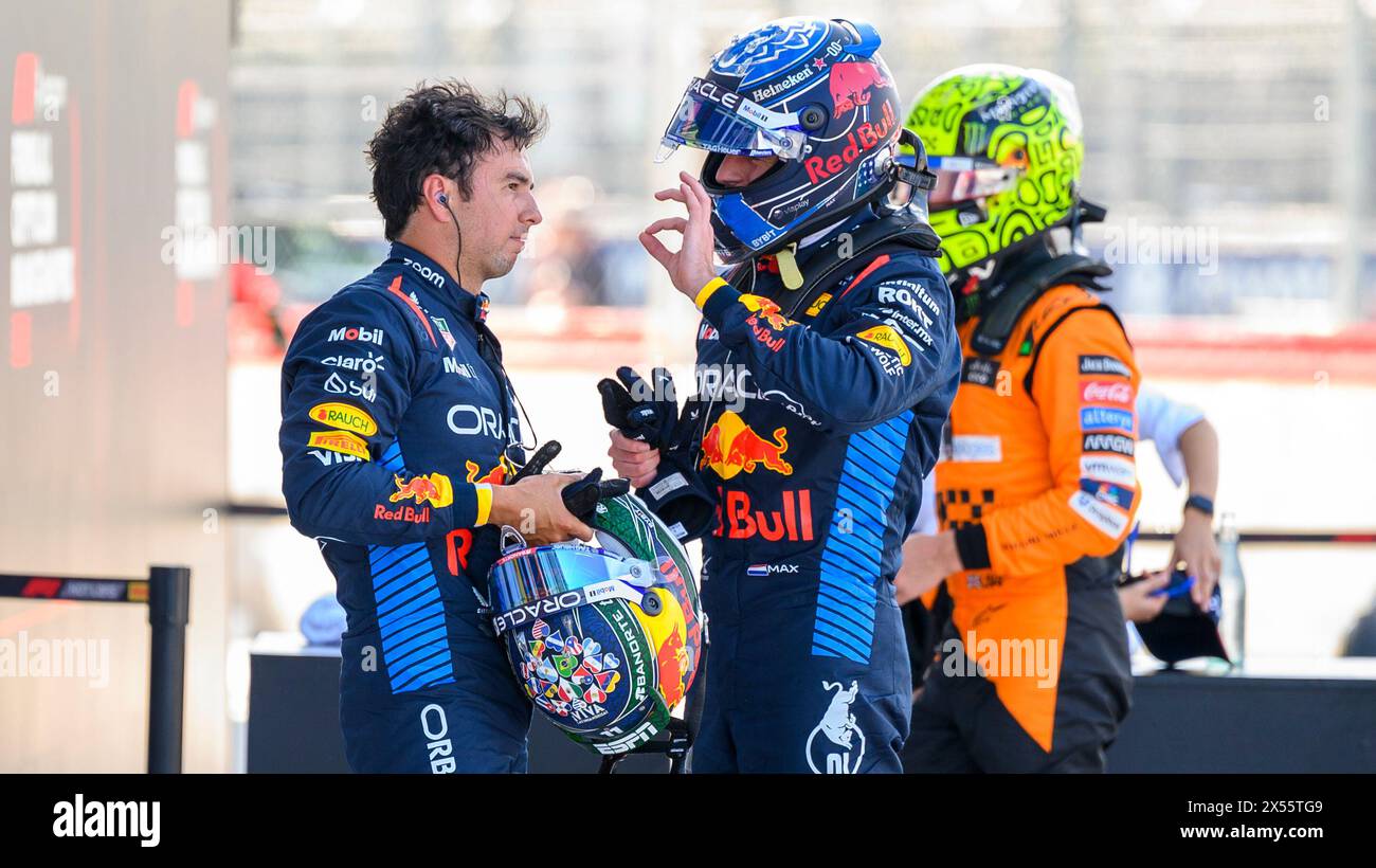 4th May 2024; Miami International Autodrome, Miami, Florida, USA; Formula 1 Crypto.com Miami Grand Prix 2024; Qualifying Day; Oracle Red Bull Racing driver Sergio Perez of Mexico and Oracle Red Bull Racing driver Max Verstappen of the Netherlands talk after the qualifying session. Stock Photo