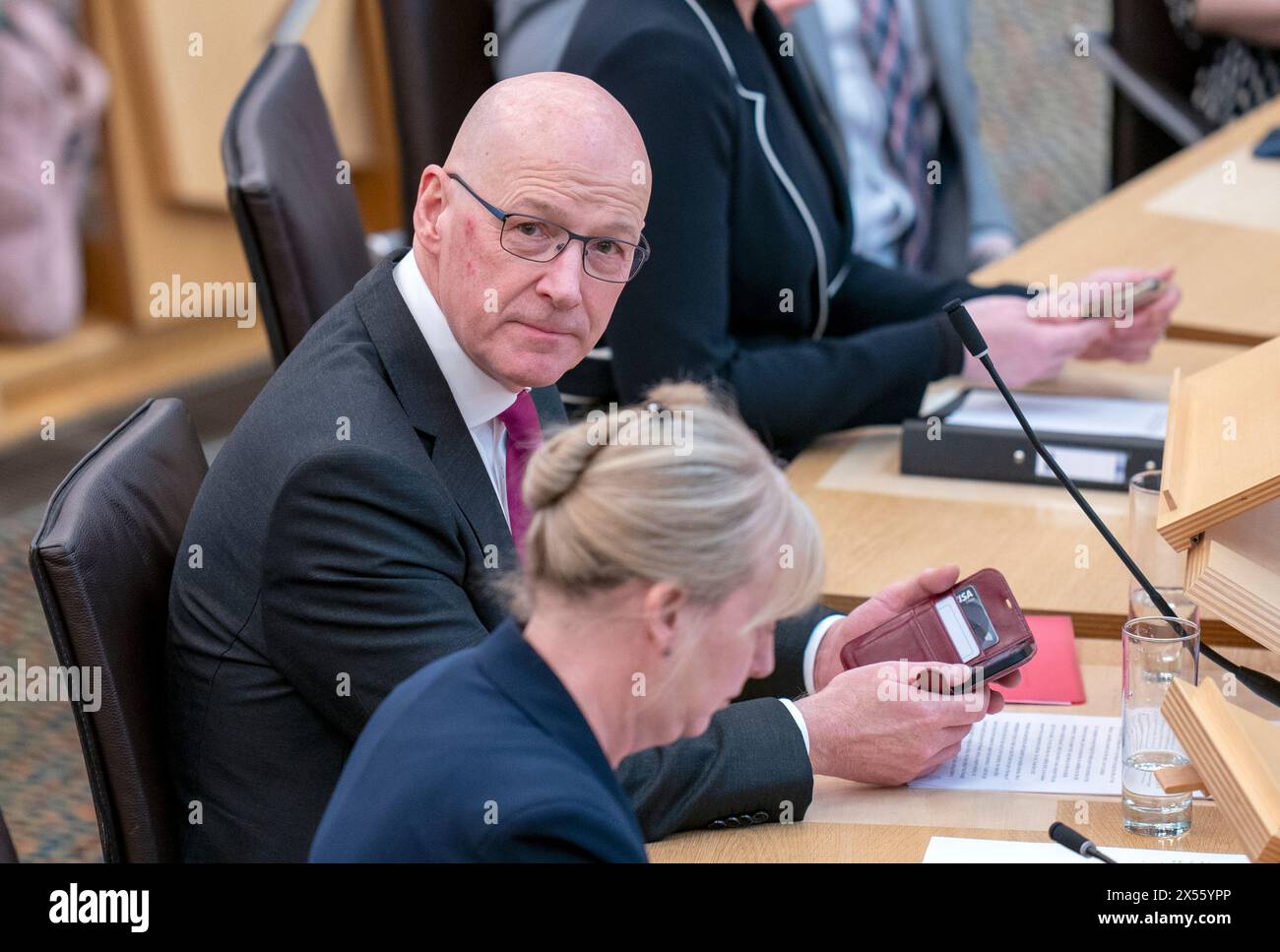 John Swinney in the main chamber during the vote for the next First Minister at the Scottish Parliament in Edinburgh. Picture date: Tuesday May 7, 2024. Stock Photo