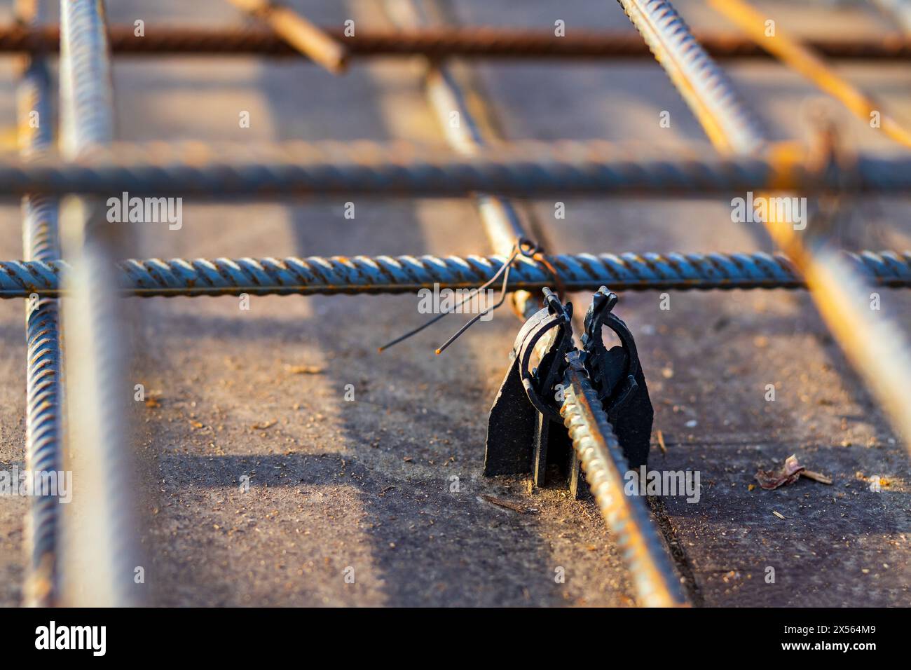 A sight of plastic rebar holders or supports demonstrates their