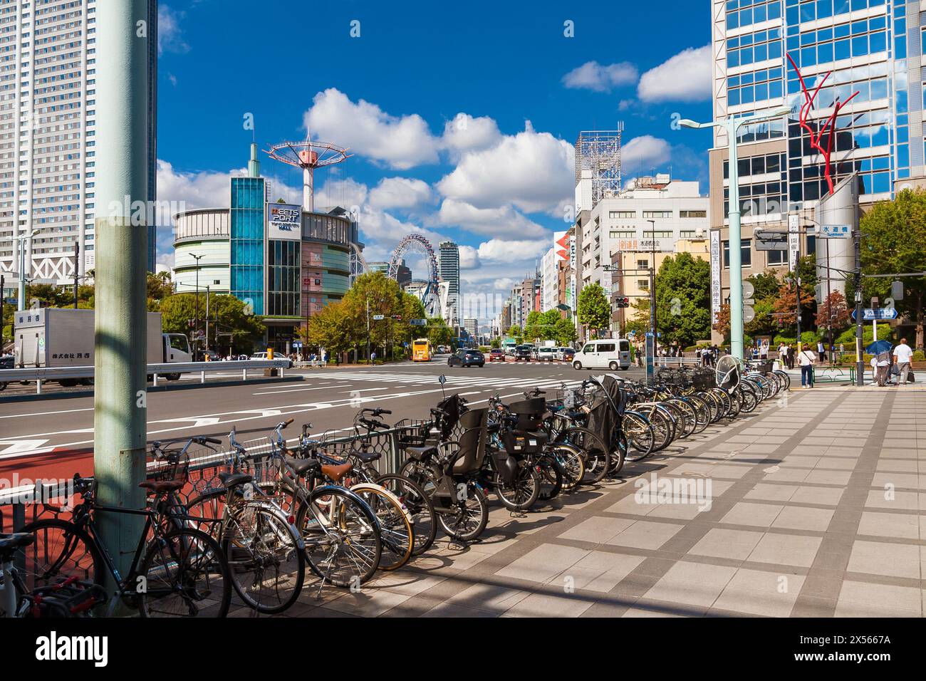 View of Tokyo Dome City Attractions amusement park in Bunkyo Ward from Suidobashi bicycle parking Stock Photo