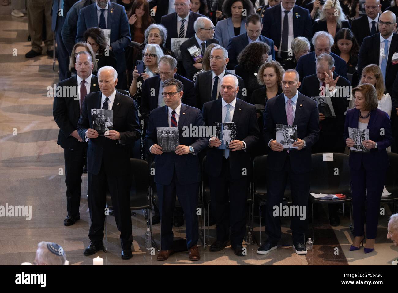 Washington, United States. 07th May, 2024. (Front L to R); US President Joe Biden, US Speaker of the House Mike Johnson, House Majority Leader Steve Scalise, House Minority Leader Hakeem Jeffries and former Speaker of the House Nancy Pelosi; hold up pictures of people who died in the Holocaust during the US Holocaust Memorial MuseumÕs Days of Remembrance ceremony at the US Capitol Building in Washington, DC, USA, 07 May 2024. Biden delivered a speech on antisemitism during the annual commemoration of the Holocaust. Credit: Sipa USA/Alamy Live News Stock Photo