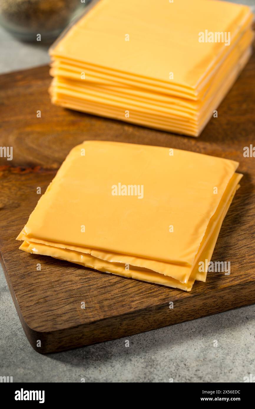Yellow Cheddar American Cheese Singles in a Stack Stock Photo
