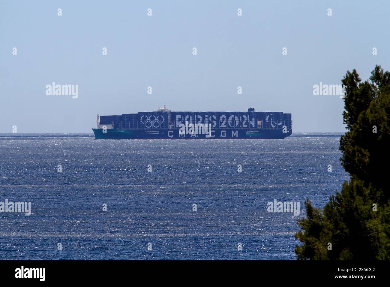 View of the CMACGM Greenland container ship, painted with colors of