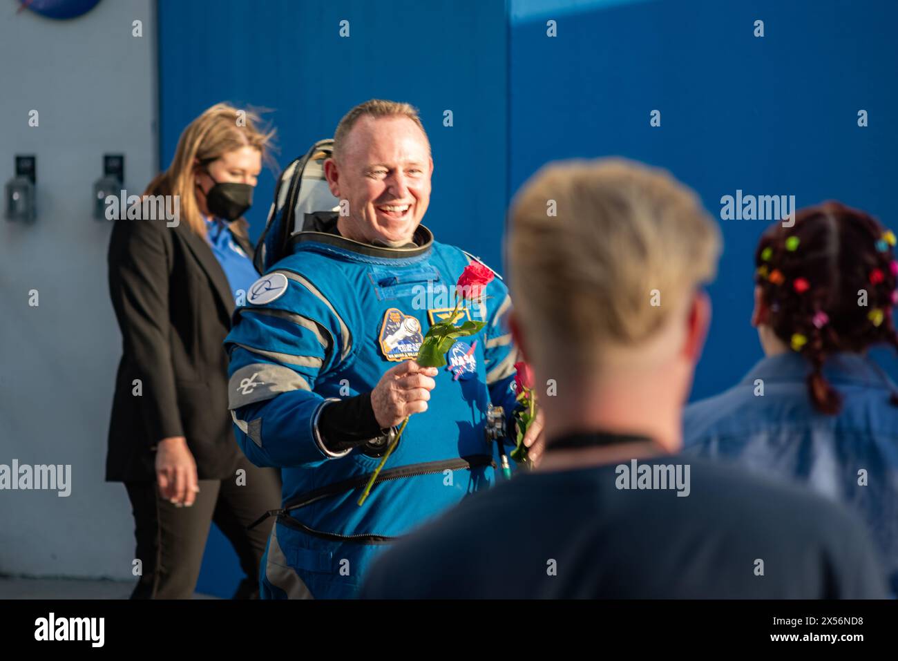 NASA Astronaut Butch Wilmore Hands Out Roses to Family Members Stock Photo