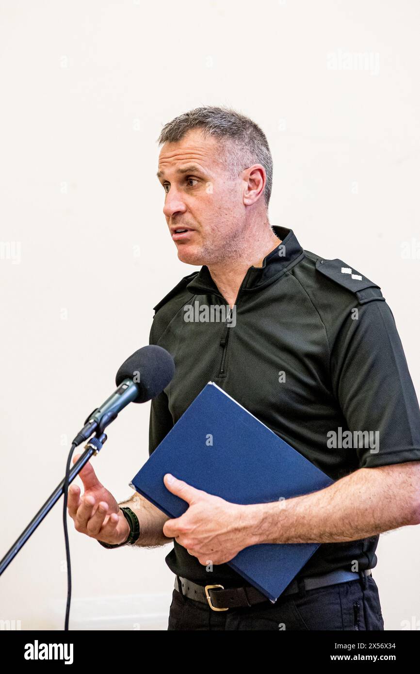 AMESBURY, WILTSHIRE, UK, 7th May, 2024 Inspector Ricky Lee, (Station Commander for Amesbury, Tidworth and surrounding villages) speaks to Amesbury Town Council regarding the plans for policing any disruption caused by two potentially colliding incidents: The use of Boscombe to remove asylum seekers who arrive in the United Kingdom (UK) under the immigration acts and Rwanda Bill, and possible protests regarding the plans for, and construction of, the Stonehenge Tunnel. Inspector Lee advised that dedicated resources were available, along with mutual aid from the wider region if necessary. Credit Stock Photo