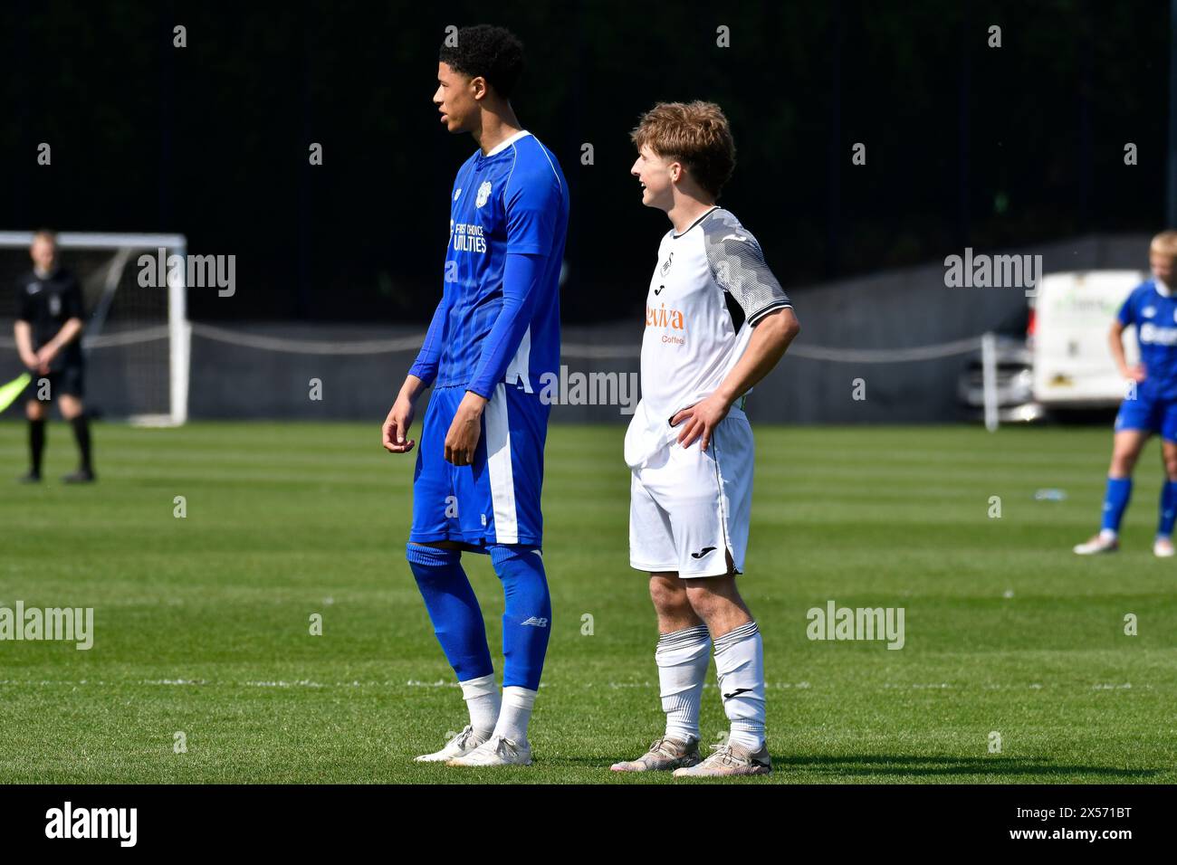 Landore, Swansea, Wales. 7 May 2024. Callum Deacon of Swansea City (right) talks to Daniel Ola of Cardiff City during the Under 18 Professional Development League match between Swansea City and Cardiff City at the Swansea City Academy in Landore, Swansea, Wales, UK on 7 May 2024. Credit: Duncan Thomas/Majestic Media/Alamy Live News. Stock Photo